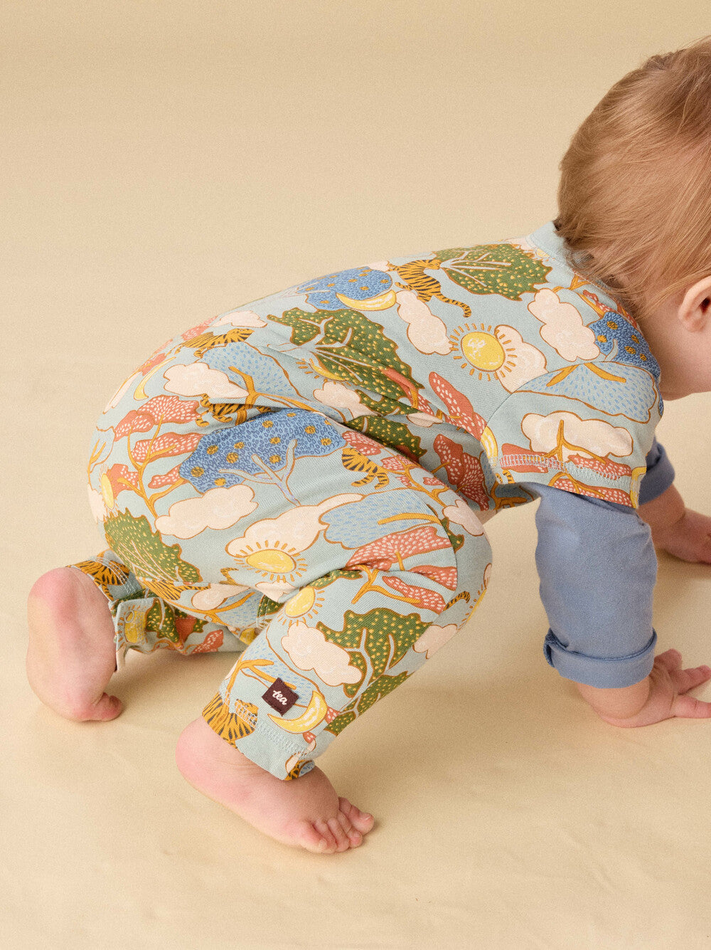 Tea Collection Layered Button-Up Baby Romper - Sun & Moon Folktale