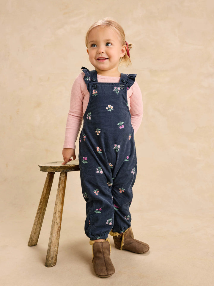 Tea Collection Corduroy Ruffle Baby Overalls - Midnight Posy