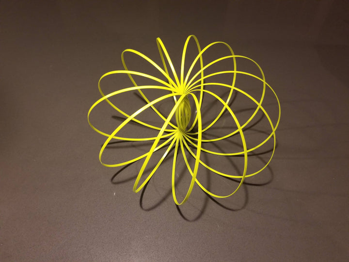 Glozi - Flow Toy - Glowing Yellow