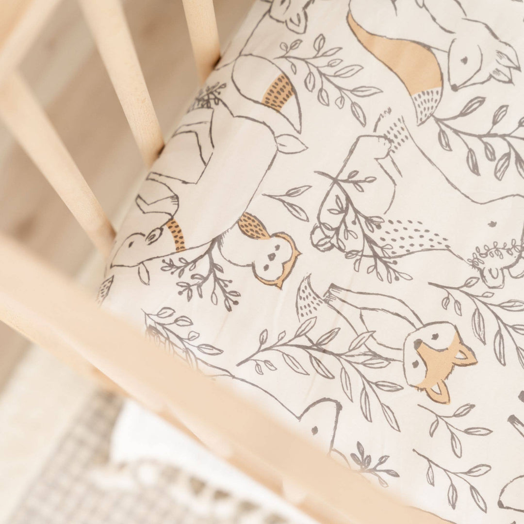 Crane Baby Crib Sheet - Ezra Woodland