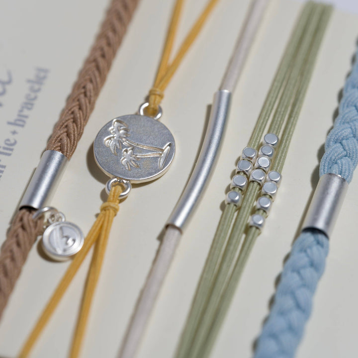 K'lani  "Grow" Earthy Toned Silver Palm Tree Charm Hair Tie Bracelets